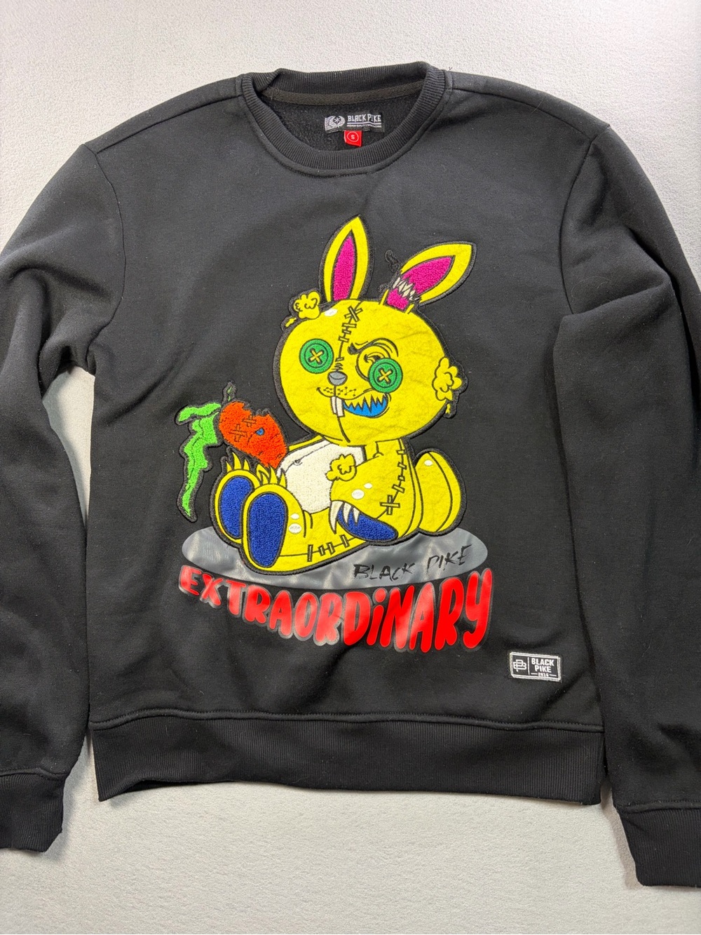 Black Pike Men’s Black Crewneck Sweatshirt with Yellow Bunny Graphic